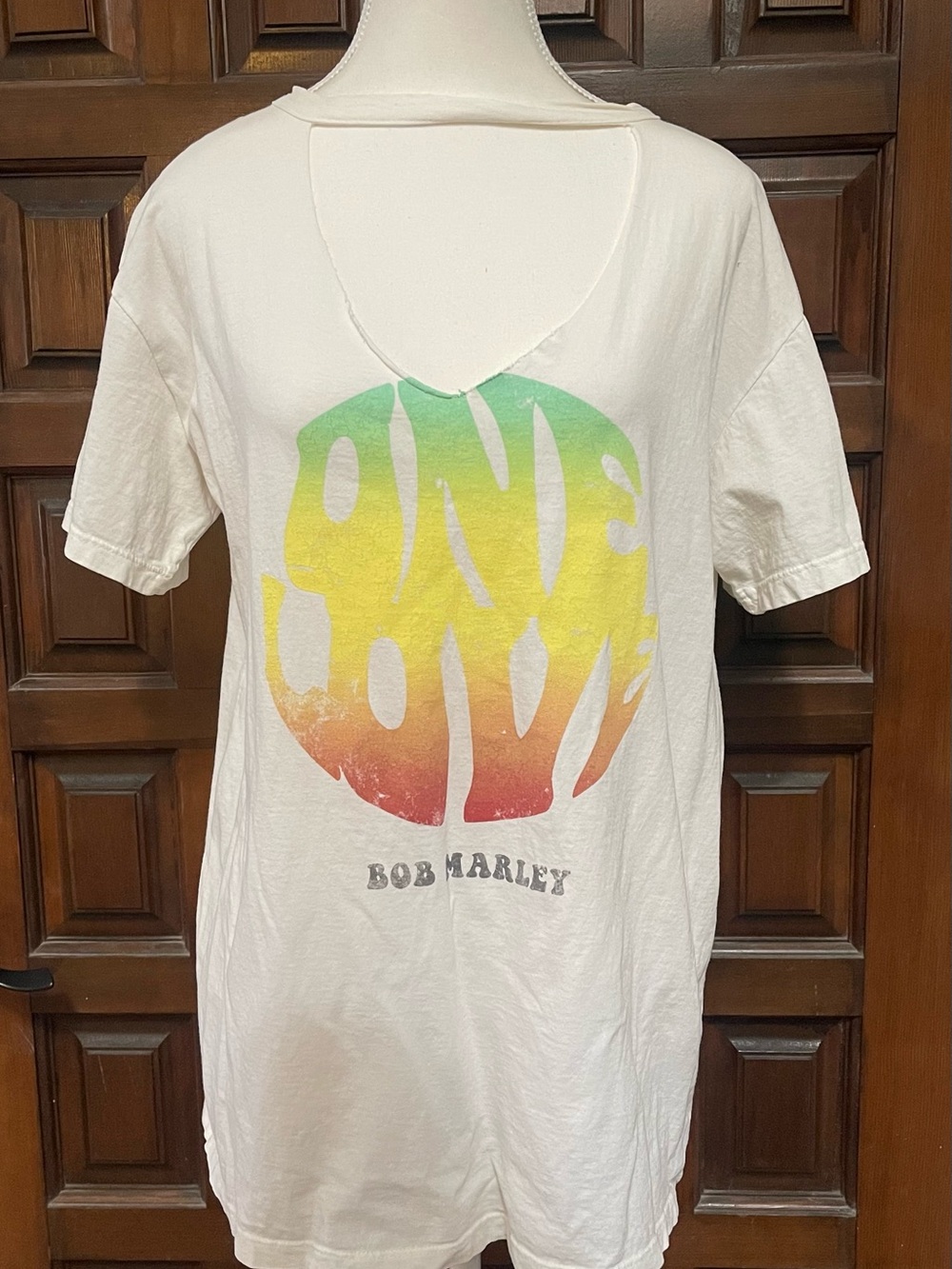 Bob Marley One Love Zion Rootswear Cream Tee with neck cut out.
